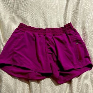 Lululemon running shorts, color fuchsia size 6